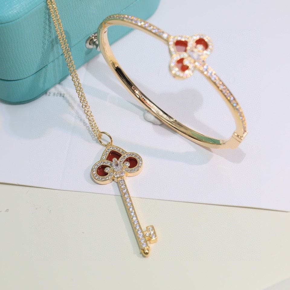 Tiffany Fleur De Lis 18K Gold Bracelet