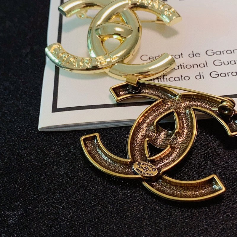 Chanel Paris Gold 18K Gold Brooch