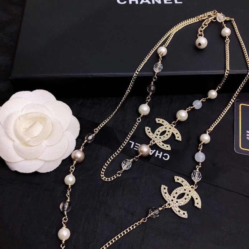 Chanel Long Pearl 18K Gold Necklace